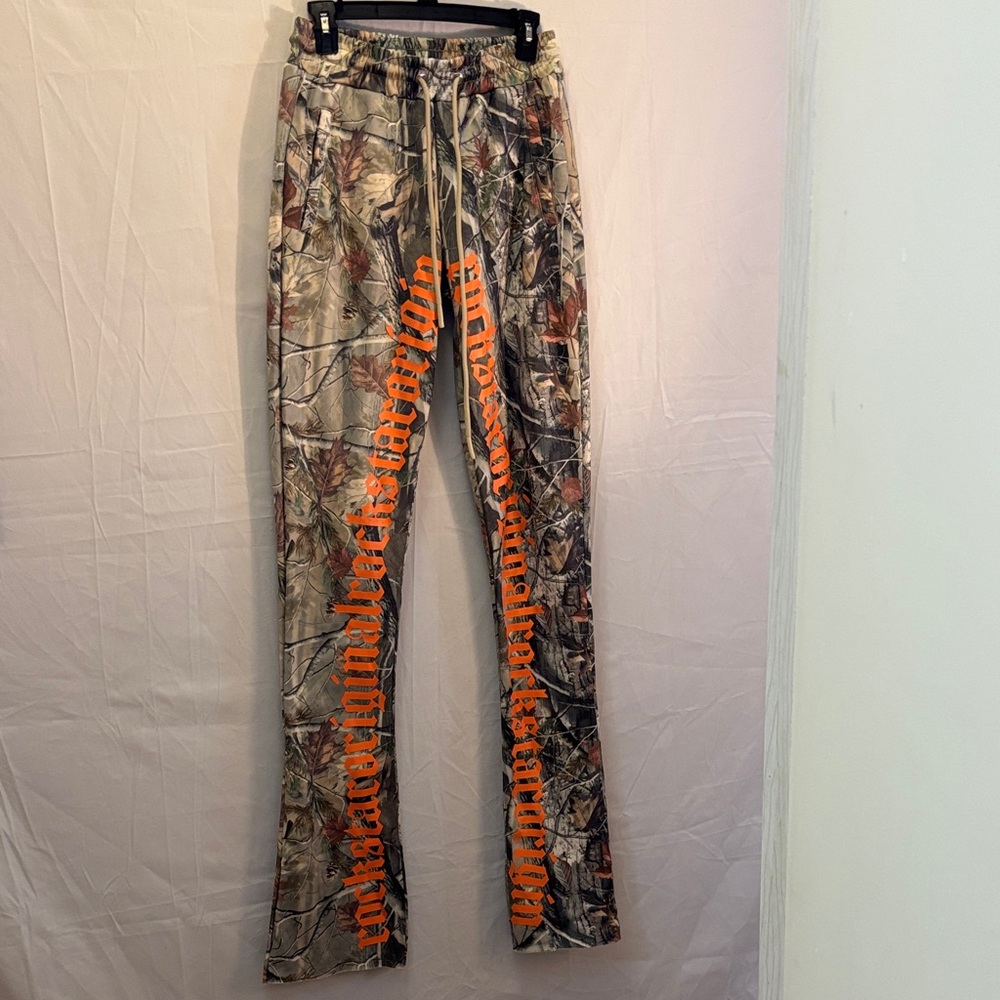 Rockstar Camouflage Pants with Orange Lettering